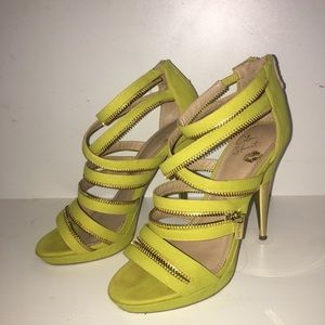Bold Yellow Heels with Gold Zipper Details